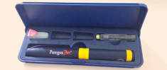 An open box displaying a Puregon Pen