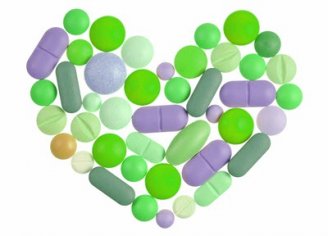 A bunch of pills shaped like a heart